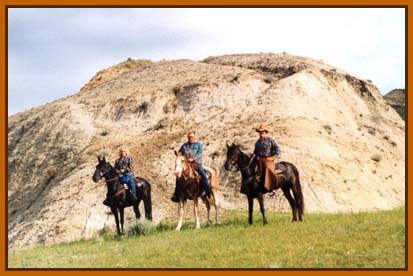 The horse and rider on the left is Duster and me.  See North Dakota isn't all flat!